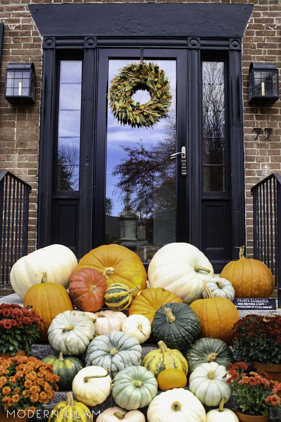 Vermont in Fall front porch with pumpkins