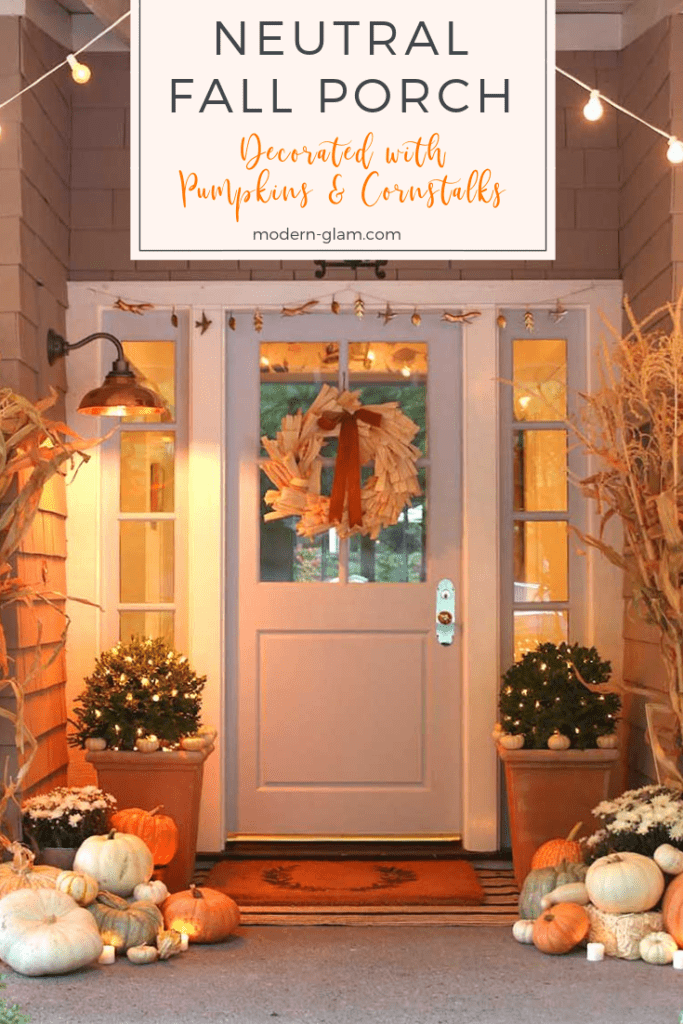 neutral fall porch decorated with pumpkins and cornstalks