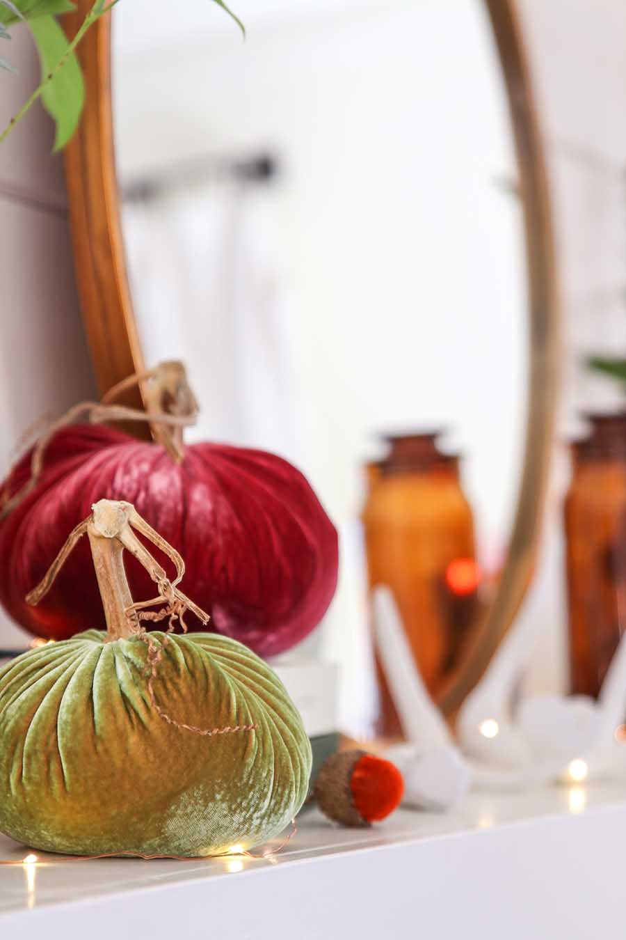 velvet pumpkins on mantel