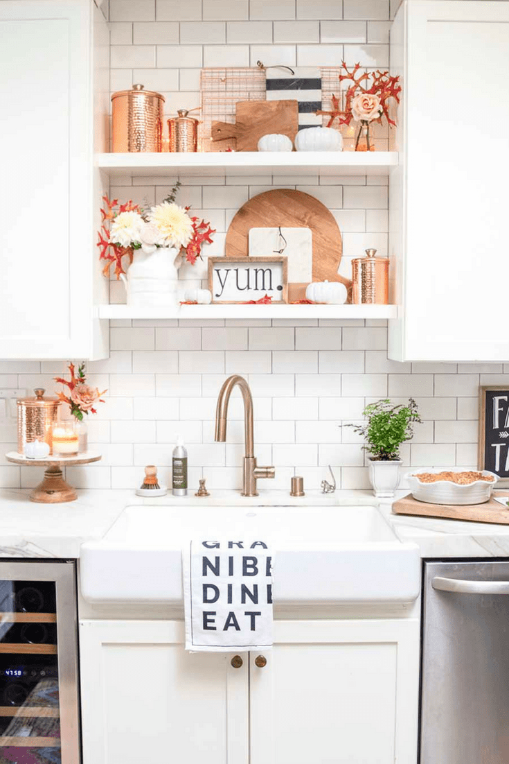 kitchen shelves with copper and breadboards