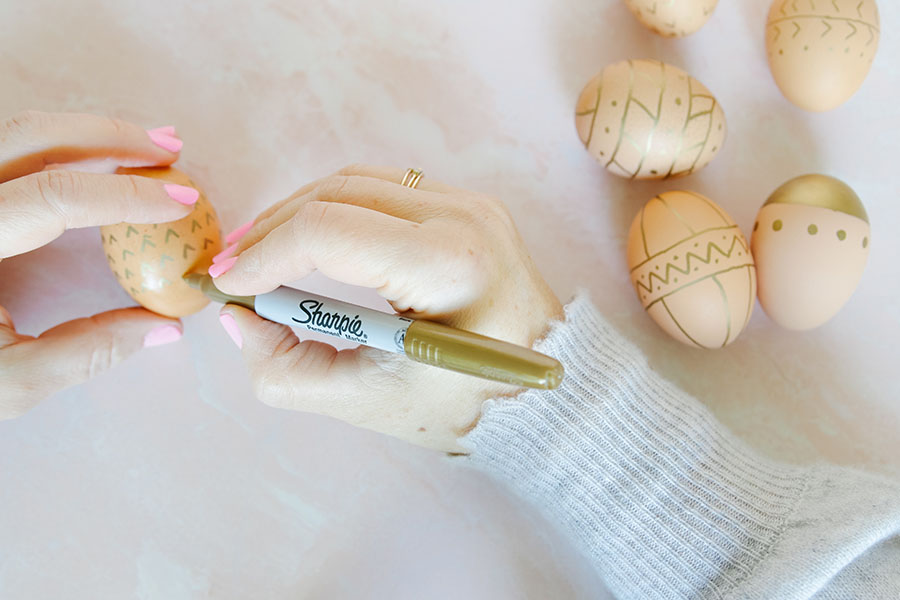 decorating brown easter eggs 