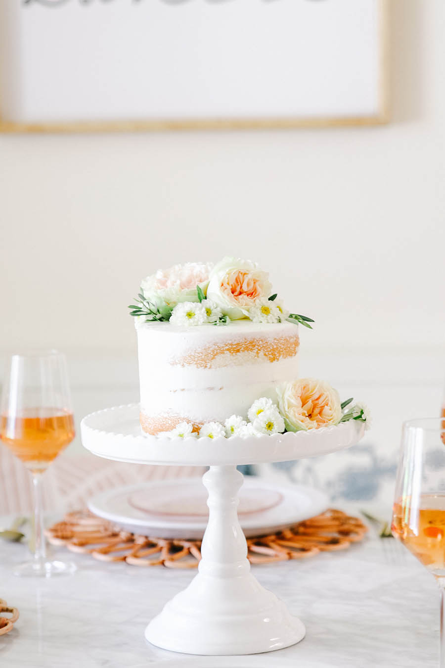 naked cake with fresh flowers