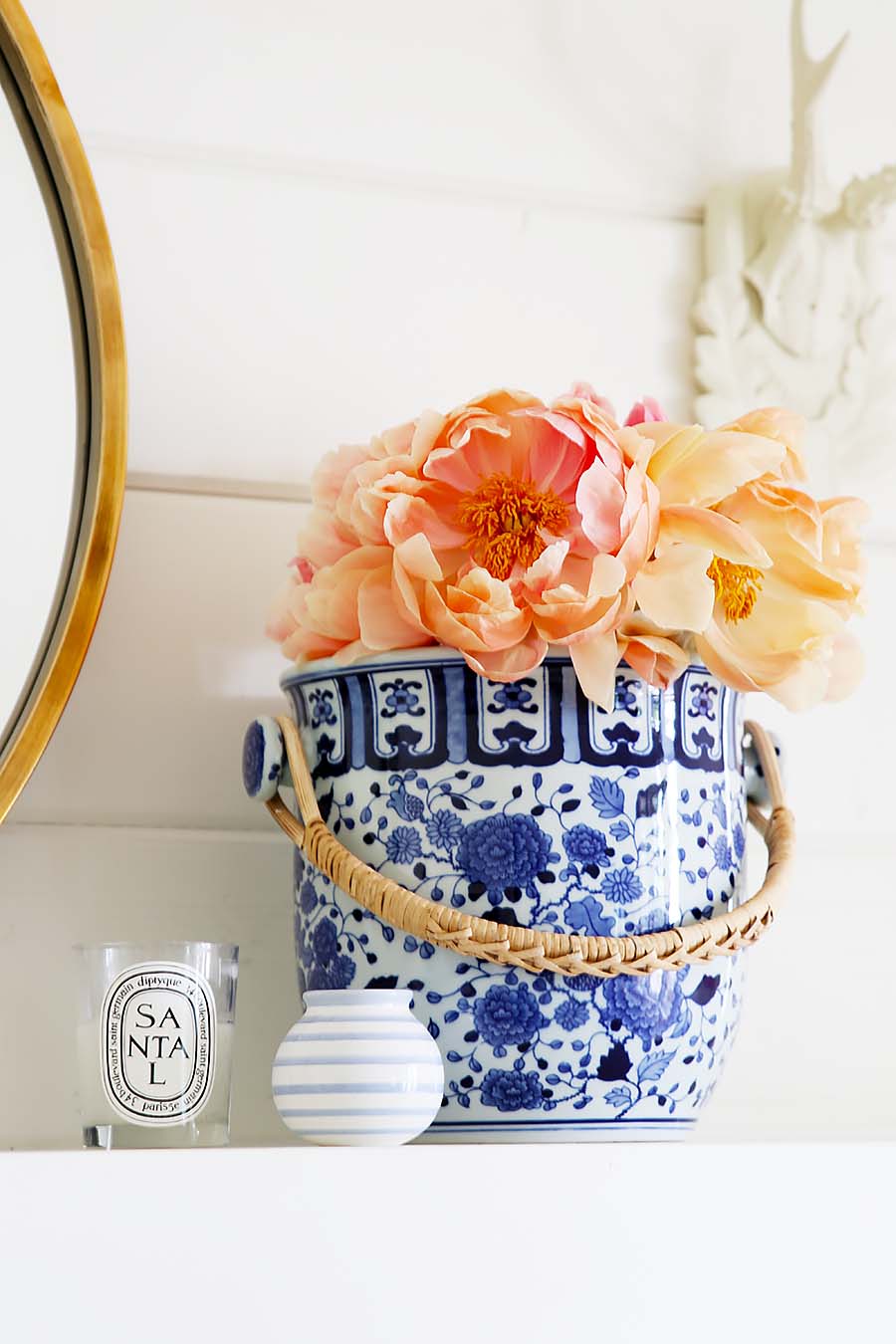 peonies in blue pot