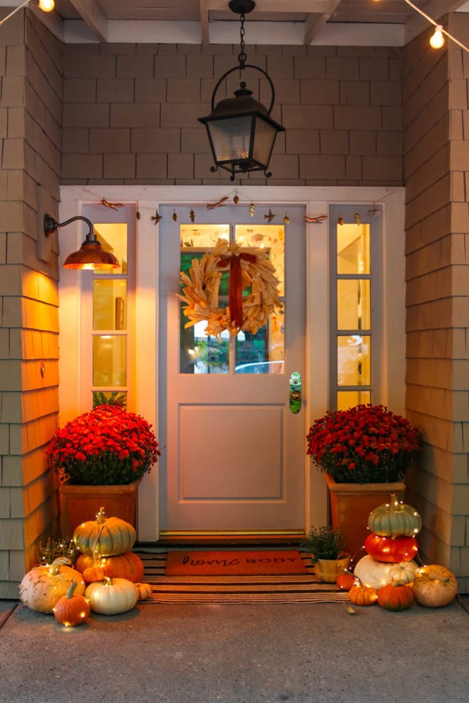 fall front porch with pumpkins