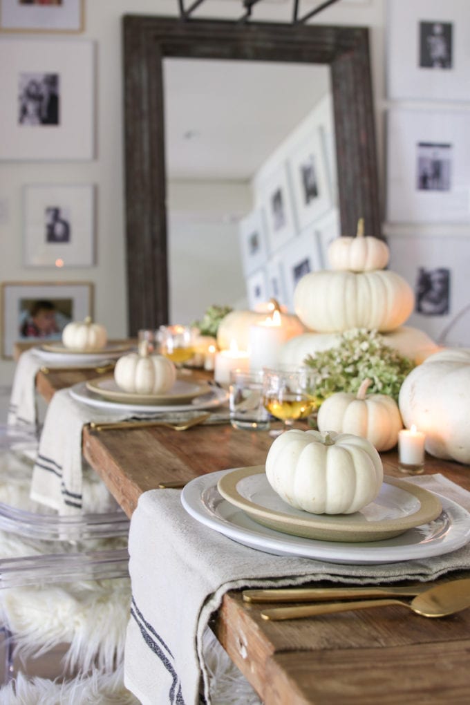 table with white pumpkins