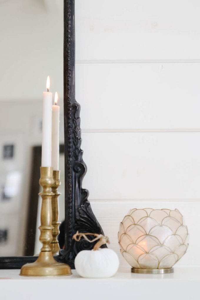 brass candlesticks on mantel