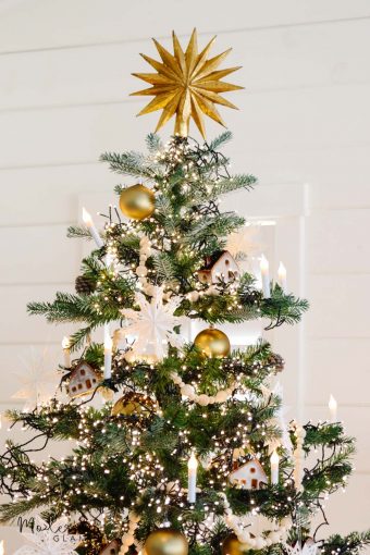 Scandinavian christmas tree with gold star