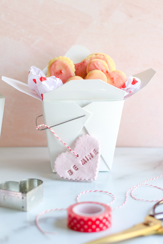 takeout boxes filled with cookies