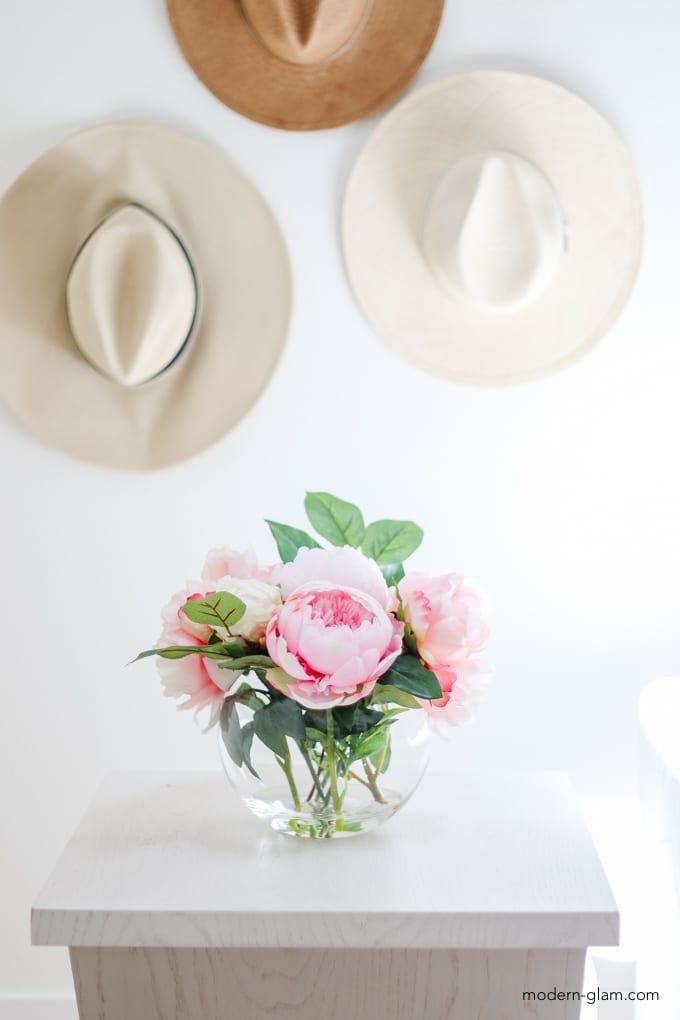 peony arrangement in glass vase