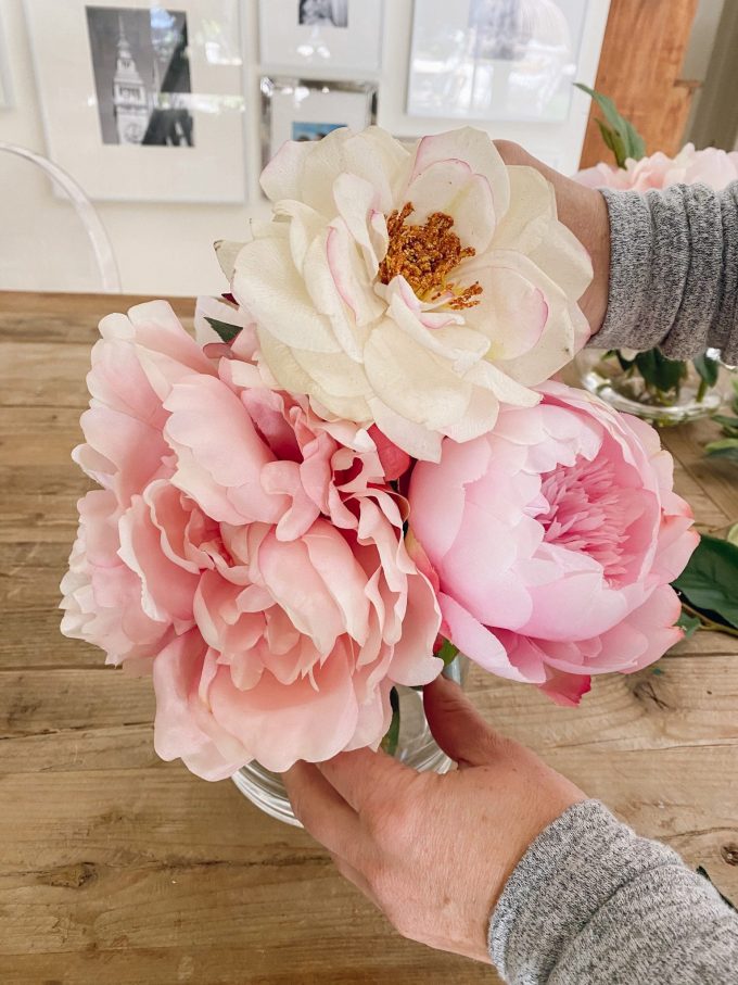 faux flowers in glass vase