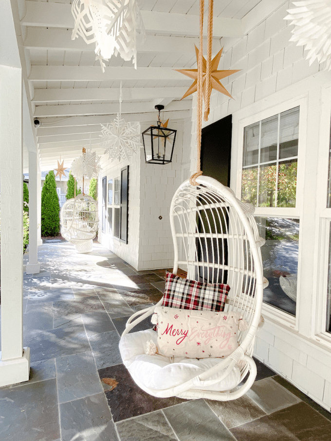 holiday porch with hanging paper lanterns