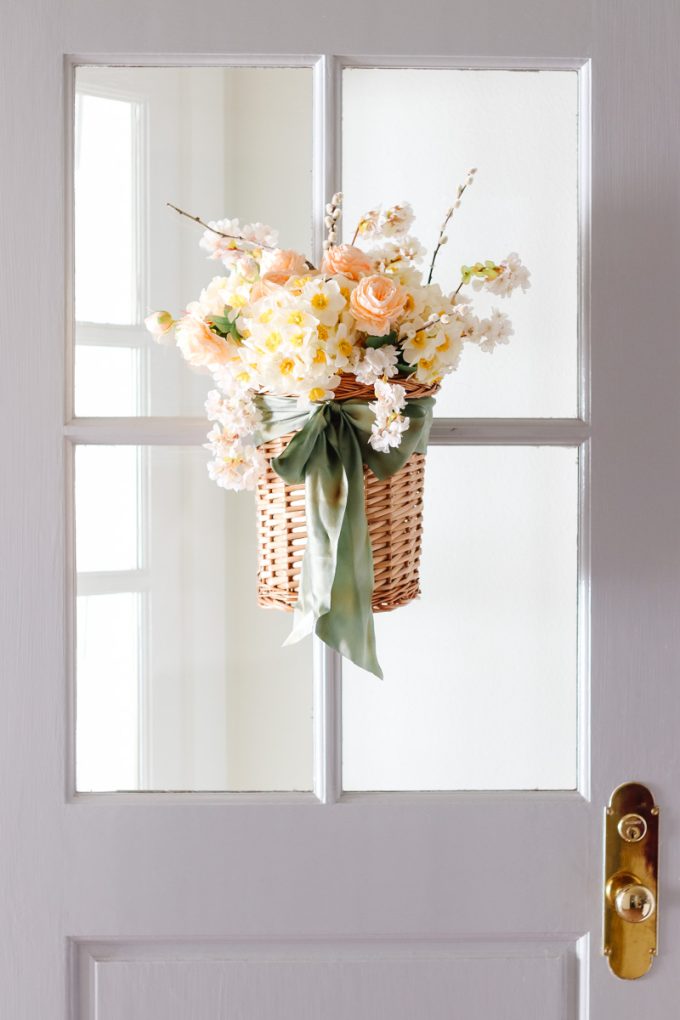 spring basket arrangement for front door