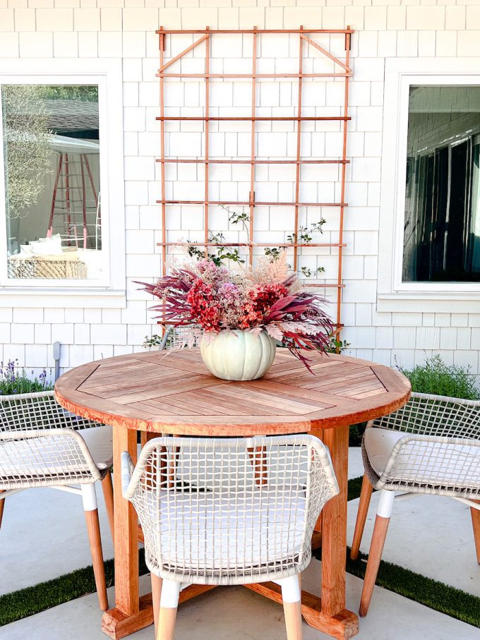 fall flower arrangement in pumpkin