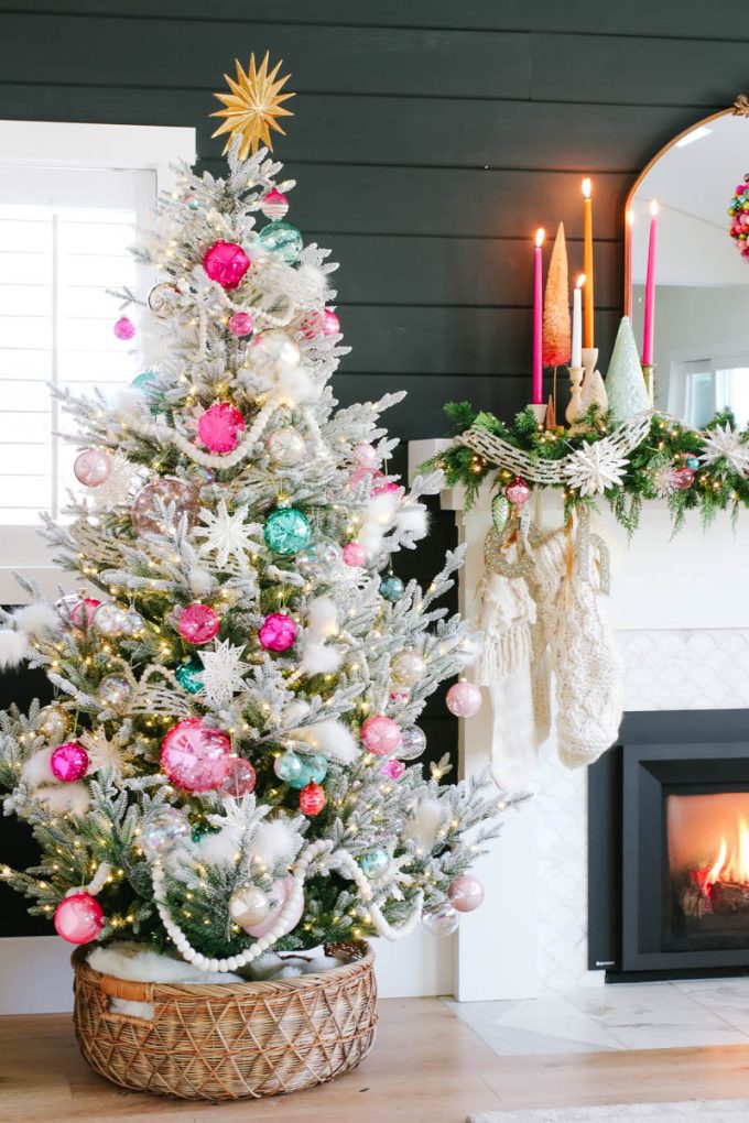 flocked tree with pink ornaments