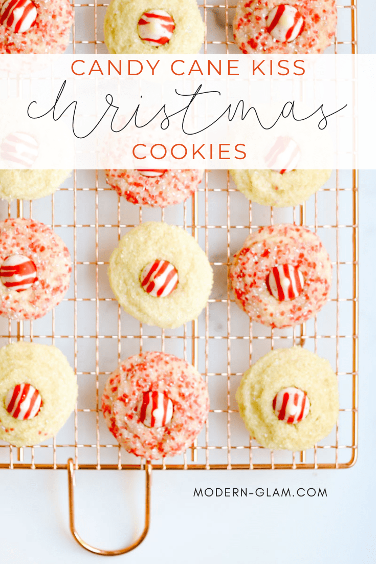Christmas cookies recipe. Make these nut-free version of the popular Peanut Blossoms. White chocolate candy cane kisses dot yummy sugar cookies flavored with peppermint and rolled in colored sugar for the perfect christmas cookie recipe. via @modernglamhome